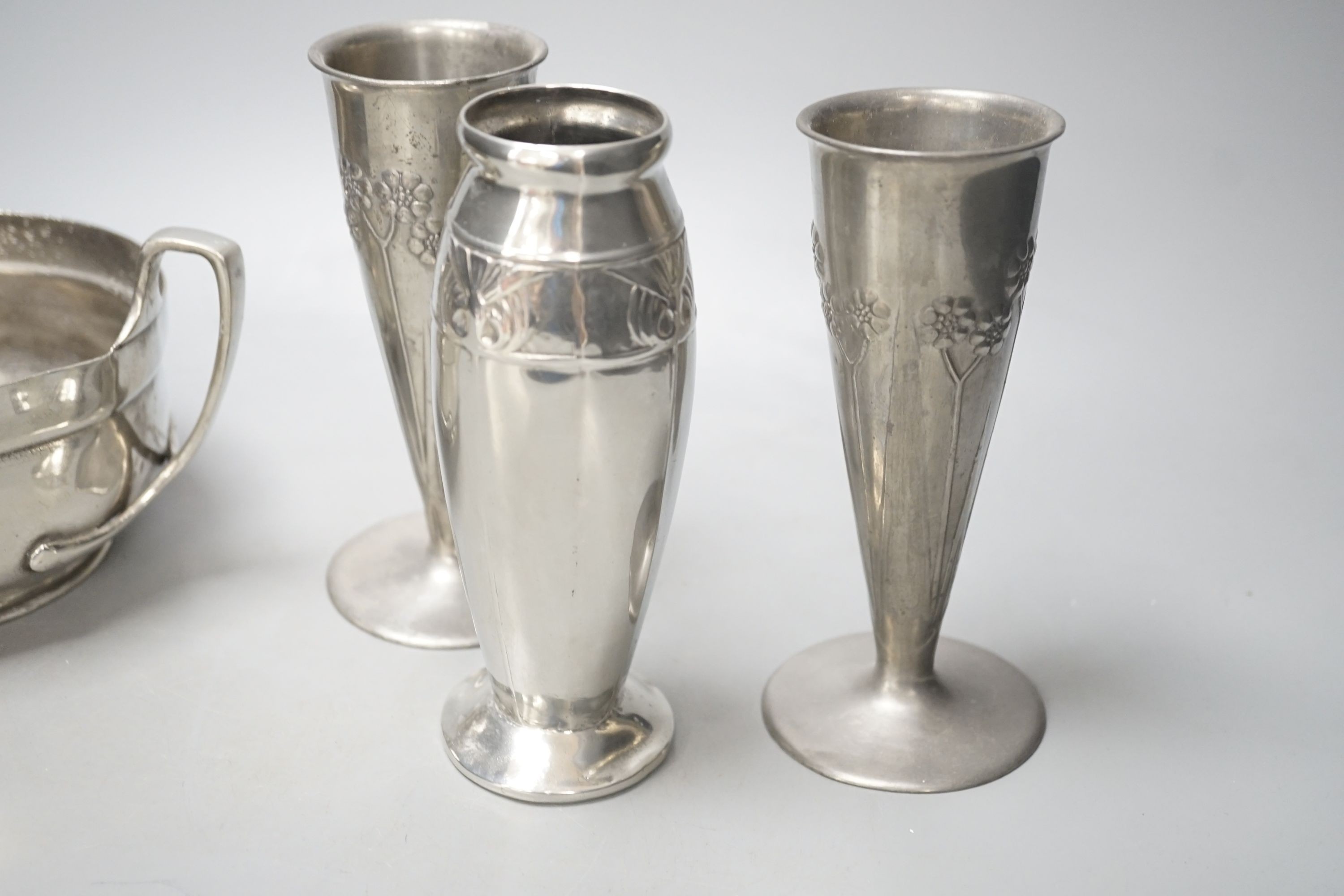 A Tudric bowl, pair of Tudric vases and one other Tudric vase. Tallest 15.5cm